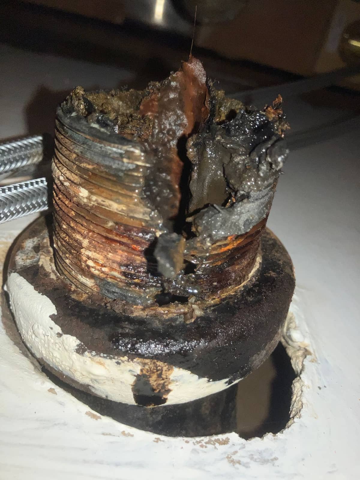 Corroded pipe fitting found and documented by Andy's Plumbing & Drain during a camera inspection