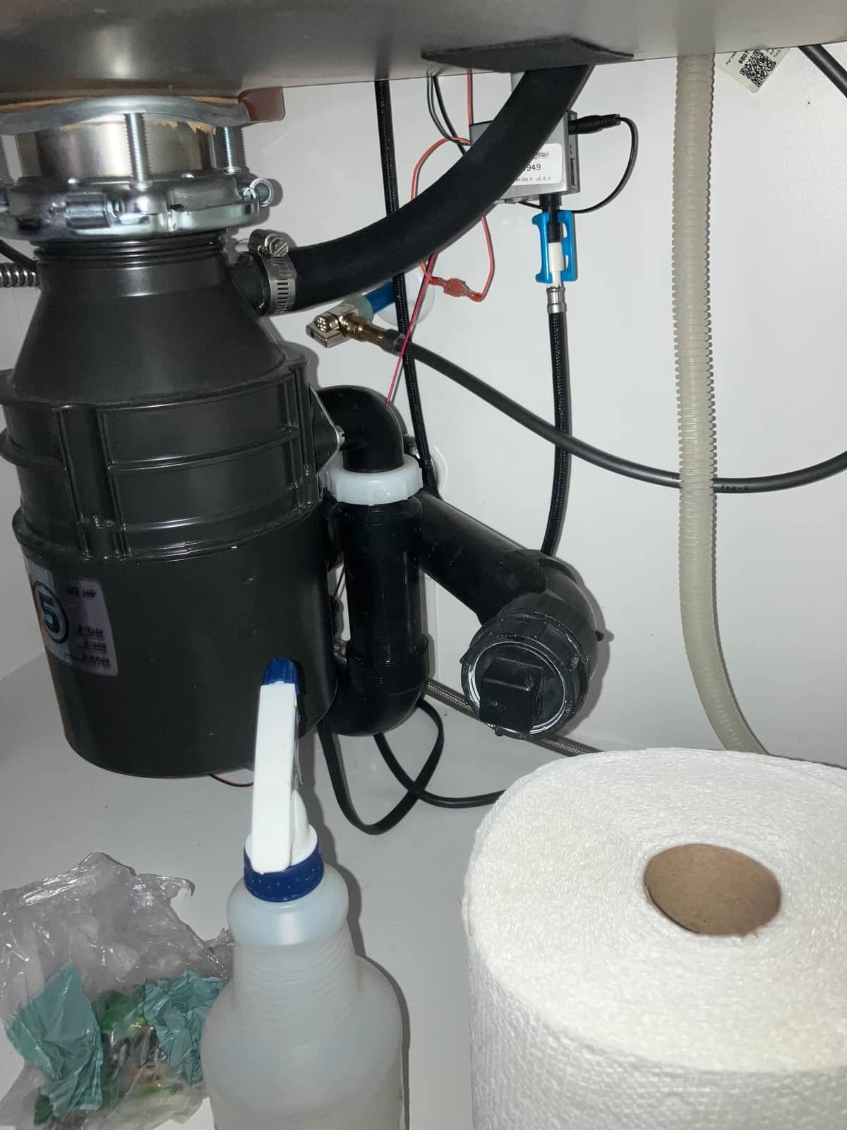 Garbage disposal and drain plumbing installed by Andy's Plumbing & Drain